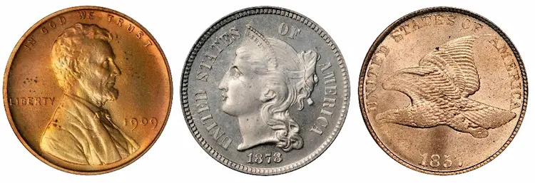 "Flyspecks" are small black spots on the surface of a coin, caused by water droplets (often saliva). "Flyspecks" are small black spots on the surface of a coin, caused by moisture droplets (often saliva).