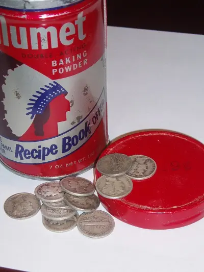 Here are the Mercury dimes Grandma gave me. All these years, they've been stored in a 19 cent Calumet baking powder can. All the dimes are common date, some badly worn.