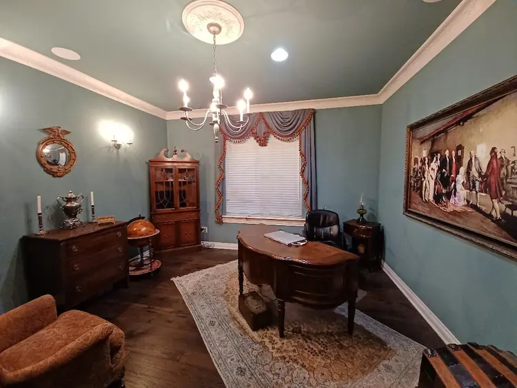 My home office was decorated in the Federal style, a prominent fashion during the War of 1812 era. The gold-colored box on top of the dresser is where the "spare change" gets tossed. The painting behind the desk is a copy of John W. Dunsmore’s 1914 work Washington Inspecting the First Money Coined by the United States.