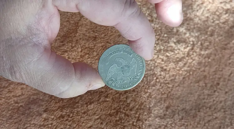 Always hold a collectible coin by its edges, to reduce the possibility of transmitting skin oils or other potentially damaging substances to the coin's surfaces. Always hold a collectible coin by its edges, to reduce the possibility of transmitting skin oils or other potentially damaging substances to the coin's surfaces.
